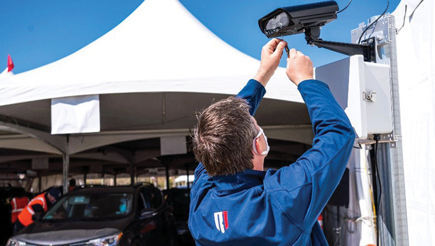 Installation of a security camera at a vaccination site at the University of Arizona