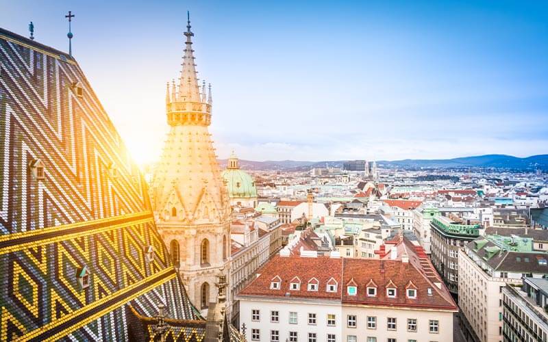 Aerial view over the rooftops of Vienna, including St. Stephen's Cathedral.