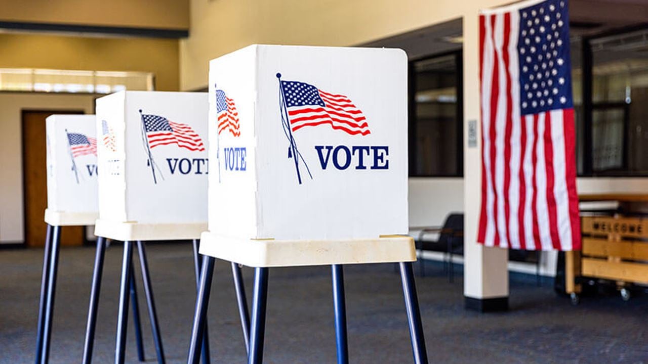 Photo of American voting booths in a community center