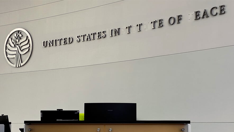 0725-Gates-USIP-Timeline-Lobby-Desk-Close-Up.jpg