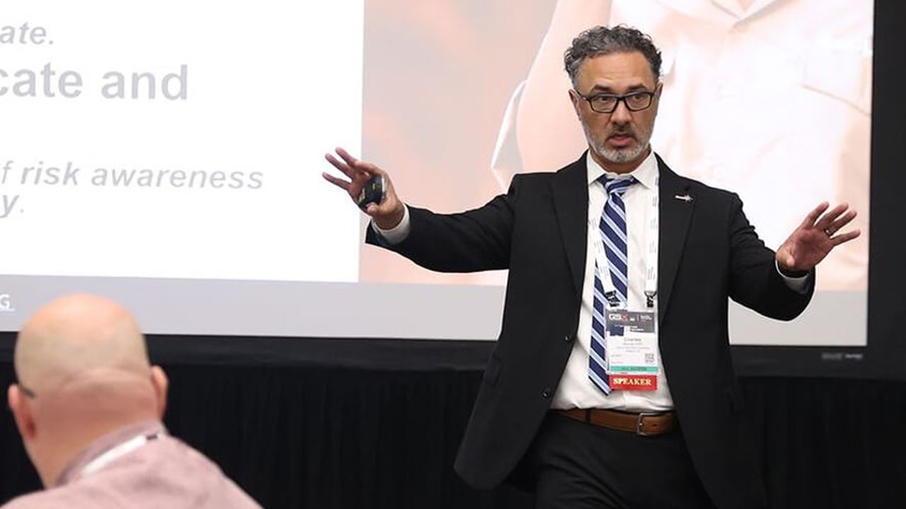 Photo of Charles Ahmad, CPP, founding partner, Group Nine Risk Consulting, leading a discussion on crime prevention and risk assessment.