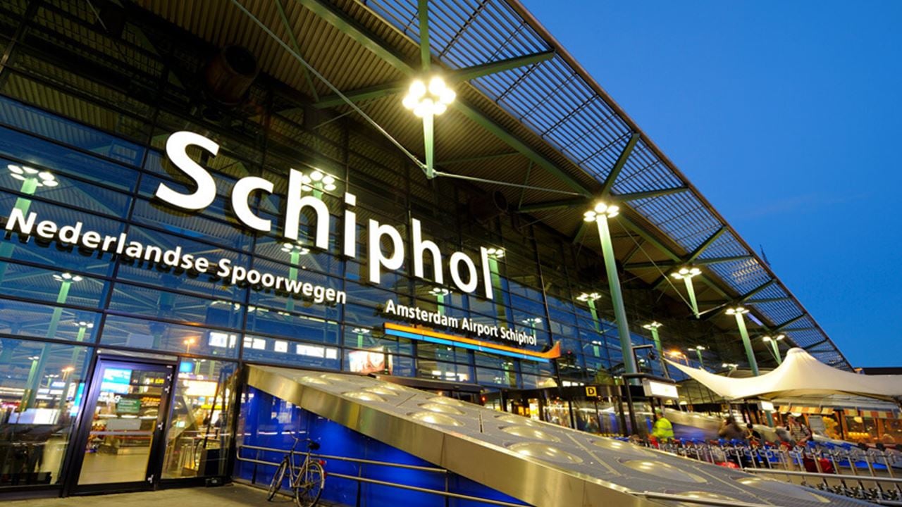 Entrance of Amsterdam Airport Schiphol at dusk, located southwest of Amsterdam.