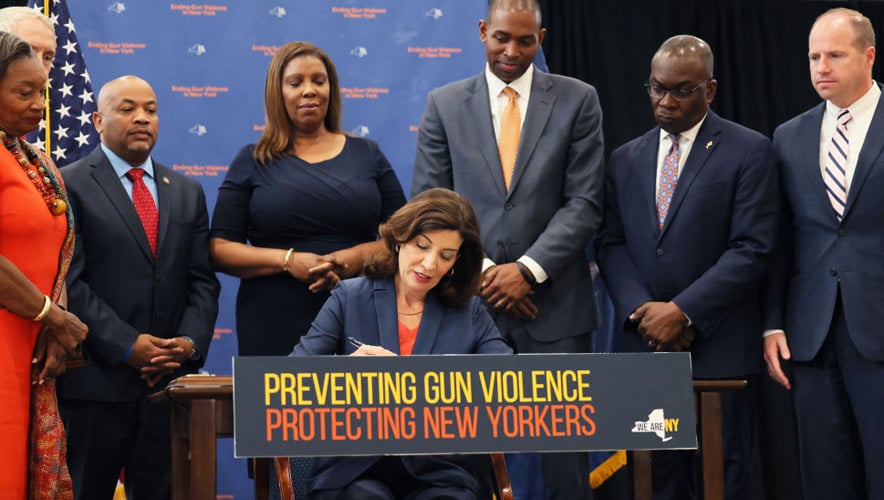 New York Governor Kathy Hochul signs series of gun reform bills on 6 June 2022. (Photo by Michael M. Santiago, Getty Images)