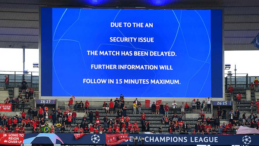 The LED screen shows the message of a delayed kick off time prior to the UEFA Champions League final match between Liverpool FC and Real Madrid at Stade de France on May 28, 2022 in Paris, France. The delay was caused when fans could not enter the stadium, creating unsafe conditions of an angry crowd that clashed with authorities on the scene.