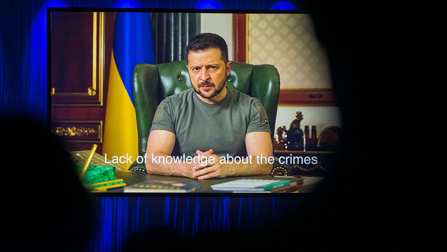 Ukrainian President Volodymyr Zelensky, seen addressing a conference in Germany on 18 October, said Russia plans to attack a dam in Southern Ukraine and blame Ukraine for the resulting catastrophe. (Photo by Thomas Lohnes/Getty Images)