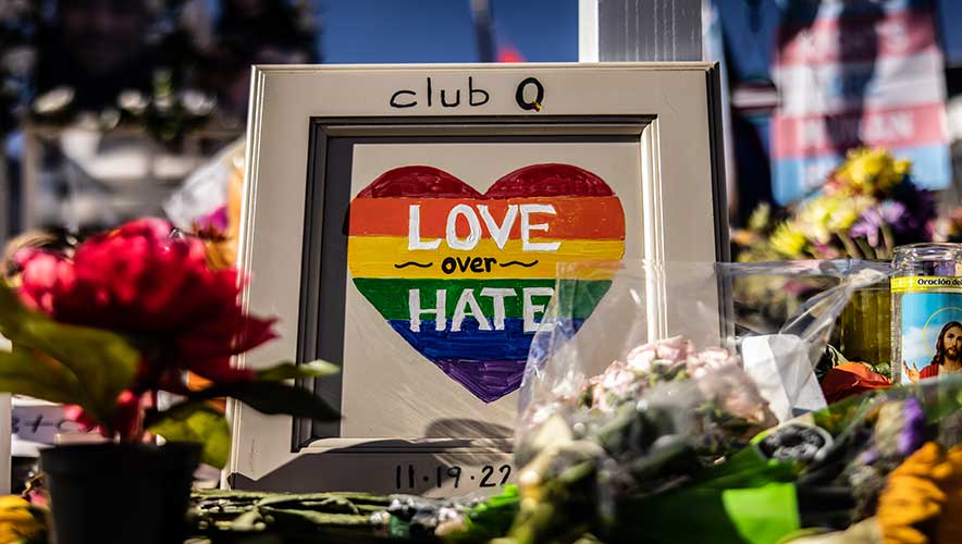 FBI report on hate crimes suffers from  low number of participating agencies reporting data. COLORADO SPRINGS, CO - NOVEMBER 22: Mourners at a memorial outside of Club Q on November 22, 2022 in Colorado Springs, Colorado. A gunman opened fire inside the LGBTQ+ club on November 19th, killing 5 and injuring 25 others.